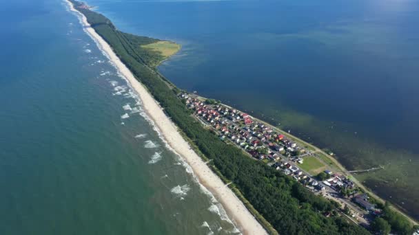 Beach in beautiful city Chalupy resort in Poland. Aerial video. Baltic Sea.Waves coming in. — Stock Video