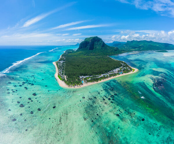 Aerial view of Mauritius island panorama and famous Le Morne Brabant mountain, beautiful blue lagoon and underwater waterfall