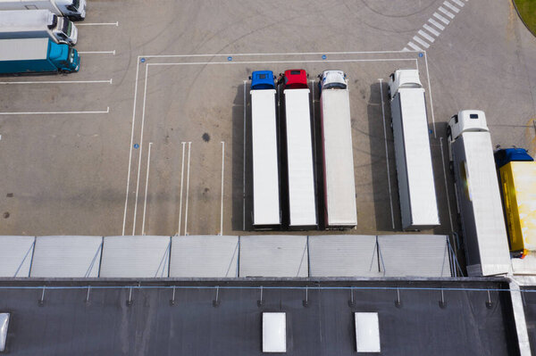 Aerial view of the distribution center, drone photography of the industrial logistic zone.