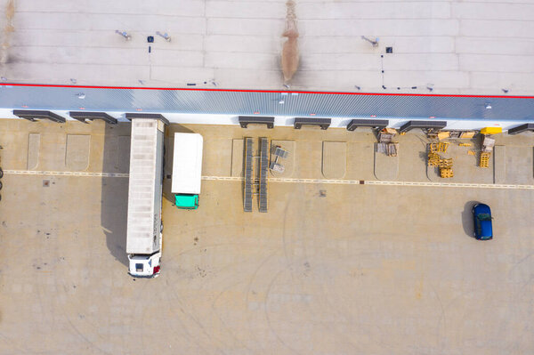 Aerial view of the distribution center, drone photography of the industrial logistic zone.
