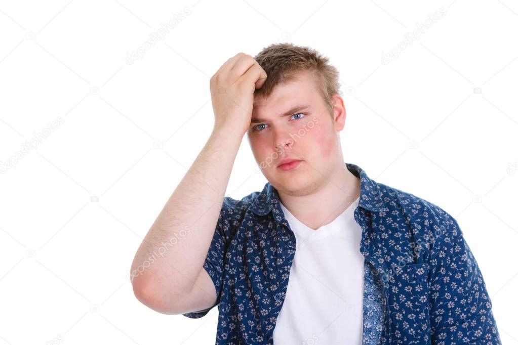 Portrait of unhappy guy, sad thoughtful young business man thinking, daydreaming deeply, bothered by mistakes, hand on head, isolated on white background. Negative human emotion, facial expression