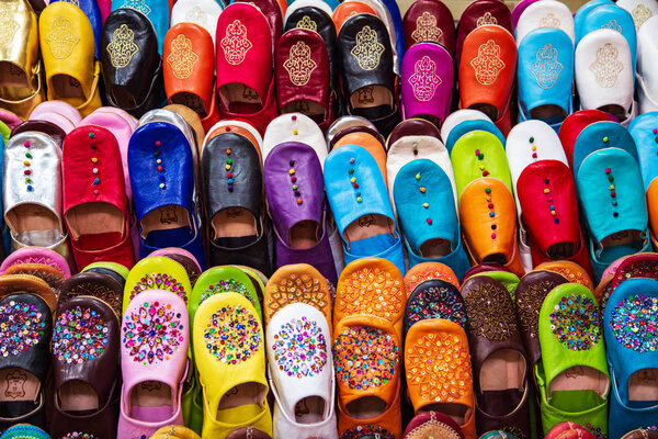 Traditional vibrant Moroccan slippers - "babouches" on the marke