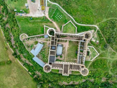 Aerial view of ruined Borgholm castle with round towers, star fort bastions on the the island of land in Sweden