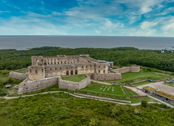 Aerial view of ruined Borgholm castle with round towers, star fort bastions on the the island of land in Sweden
