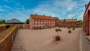 Panoramic view of Landskrona castle yard with red brick buildings in Sweden