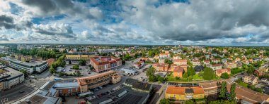 Vxj: A compact and green city center with a blend of modern architecture and historic landmarks along the shimmering lake