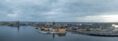 Aerial panorama view of Stockholm waterfront with city hall, old town reflecting on the water