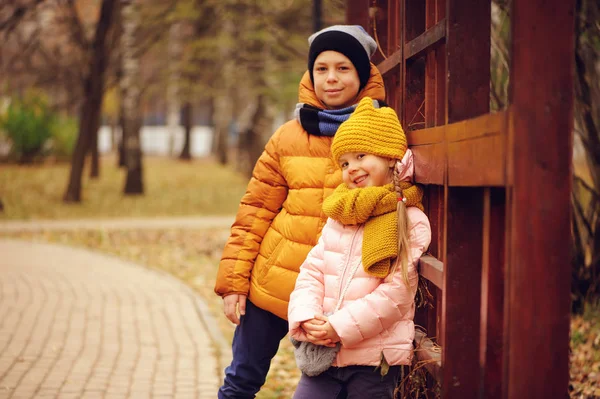 Autumn Portrait Happy Kids Brother Sister Sitting Bench Park Hugs — Stock Photo, Image