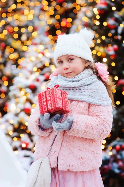 Happy Child Girl Holding Christmas Gift Outdoor Walk Snowy Winter — Stock Photo, Image