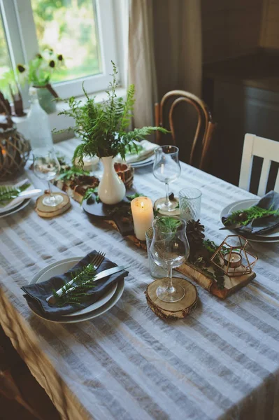 summer table setting in natural organic style with handmade details in green and brown tones. Country living concept