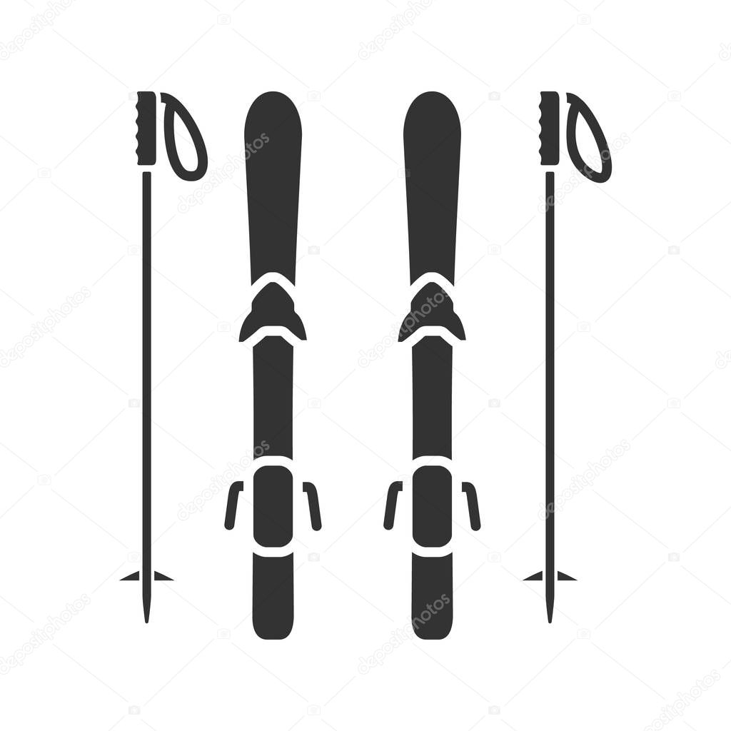 Skiing equipment glyph icon. Ski boards and poles. Silhouette symbol. Negative space. Vector isolated illustration
