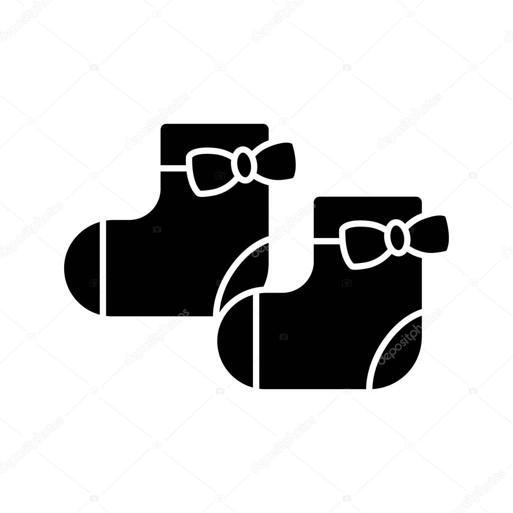 Baby girl socks glyph icon. Silhouette symbol. Negative space. Vector isolated illustration