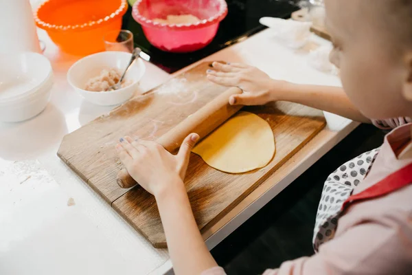 Master class on cooking, pasta, dumplings in a beautiful kitchen for children