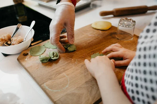 stock image Master class on cooking, pasta, dumplings in a beautiful kitchen for children