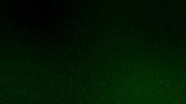 4K Sparkle parlak yeşil parçacık hareketi siyah gradyan arka plan, galakside yıldız ışığı nebulası evrende