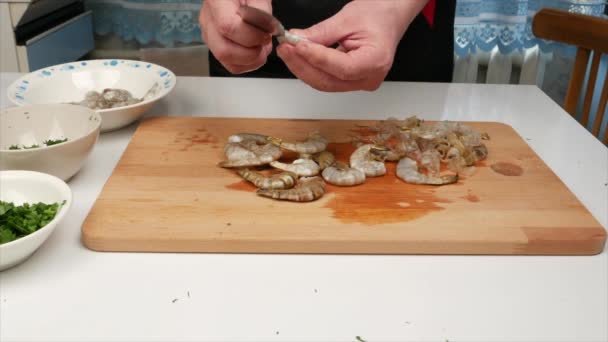 Man Cuts Shrimp Seafood — Stock Video