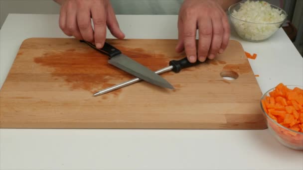Man Sharpens Kitchen Knife Honing Steel Close — Stock Video