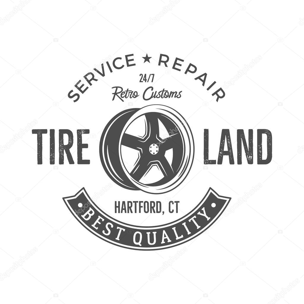 Vintage label design. Tire service emblem in monochrome retro style with vector old wheel and typography elements. Good for tee shirt design, prints, car service logo, repair station label, pathes