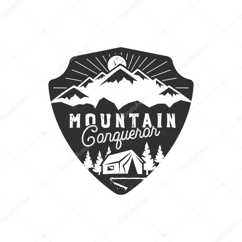 Traveling, outdoor badge. Mountain conqueror emblem. Vintage hand drawn design. Monochrome palette. Stock vector illustration, insignia, rustic patch. Isolated on white background.