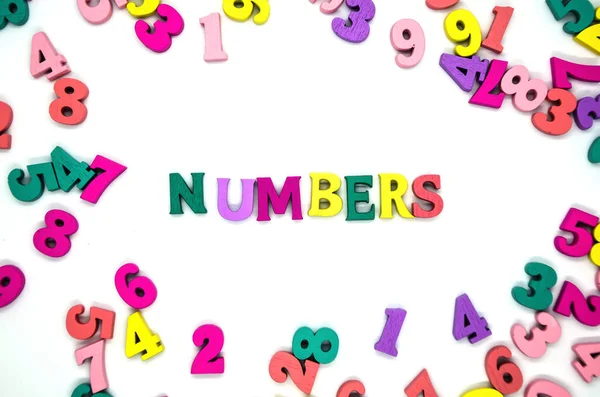 Word Numbers Laid Out Wooden Multicolored Letters Surrounded Scattered Colored — Stock Photo, Image