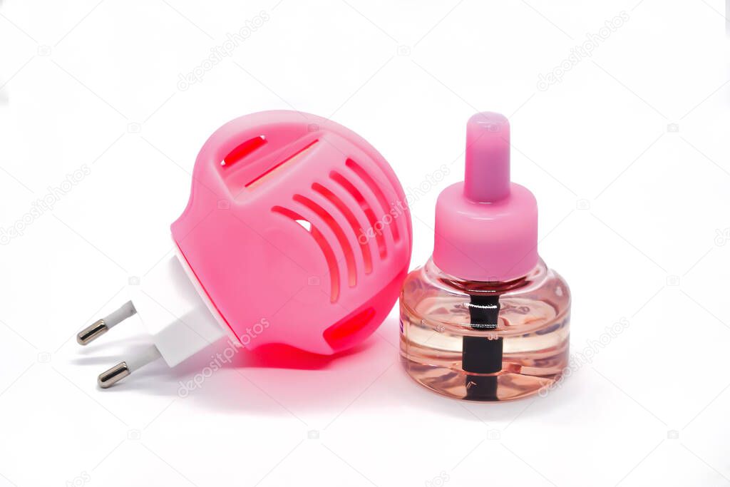 Pink plastic room electric evaporator fumigator insect repellents from euro plug for socket and removable liquid container on white. Safe protection against mosquitoes and other insects inside home