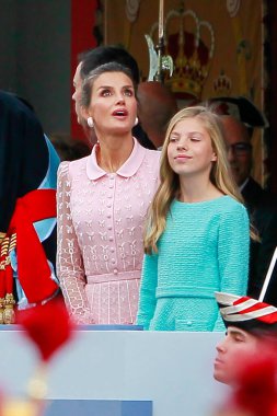 Madrid, Spain- October 12, 2019:The Kings of Spain, along with their daughters, the Princess of Asturias and her sister, the Infanta Doa Sofia, preside over the Armed Forces Day parade in Madrid