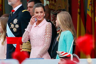 Madrid, Spain- October 12, 2019:The Queen of Spain, Doa Letizia, comments with her daughter. the Infanta Doa Sofia, the parade of the Armed Forces in Madrid