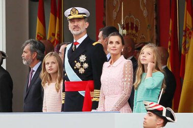 Madrid, Spain- October 12, 2019:The Kings of Spain, along with their daughters, the Princess of Asturias and her sister, the Infanta Doa Sofia, preside over the Armed Forces Day parade in Madrid