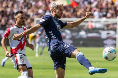 Madrid, İspanya - 21 Eylül 2025: Madrid 'de oynanan Rayo Vallecano ve Celta de Vigo ligi maçı. Celta oyuncuları. Rayo oyuncuları. EA Spor Ligi 2024, 2025. İspanyol futbolu.