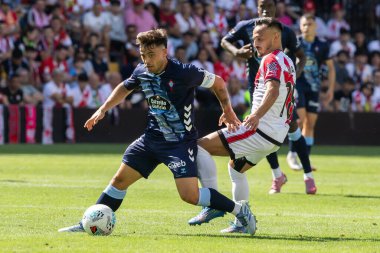 Madrid, İspanya - 21 Eylül 2025: Madrid 'de oynanan Rayo Vallecano ve Celta de Vigo ligi maçı. Celta oyuncuları. Rayo oyuncuları. EA Spor Ligi 2024, 2025. İspanyol futbolu.