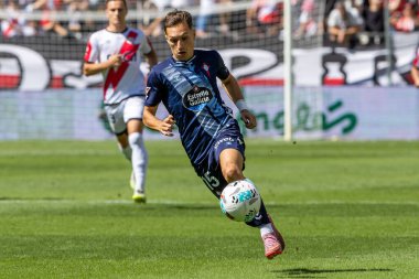 Madrid, İspanya - 21 Eylül 2025: Madrid 'de oynanan Rayo Vallecano ve Celta de Vigo ligi maçı. Celta oyuncuları. Rayo oyuncuları. EA Spor Ligi 2024, 2025. İspanyol futbolu.