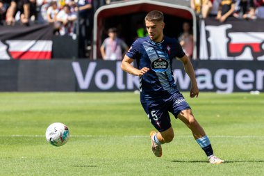 Madrid, İspanya - 21 Eylül 2025: Madrid 'de oynanan Rayo Vallecano ve Celta de Vigo ligi maçı. Celta oyuncuları. Rayo oyuncuları. EA Spor Ligi 2024, 2025. İspanyol futbolu.