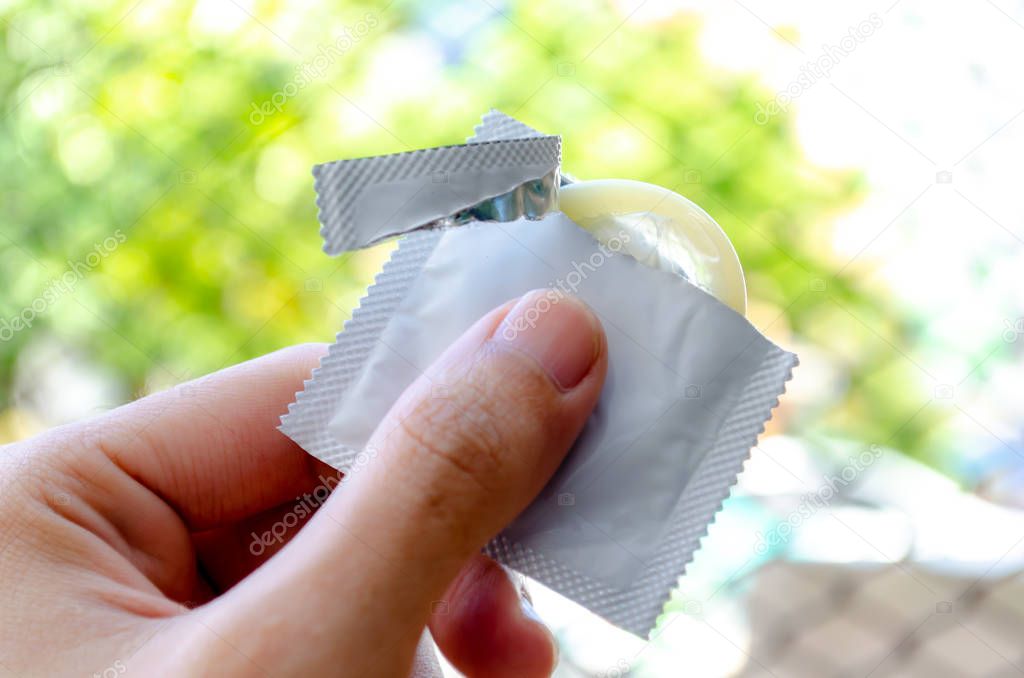 Condoms in Hand