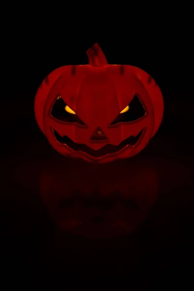 Halloween Pumpkin Yellow Eyes Reflected Surface Foreground — Stock Photo, Image