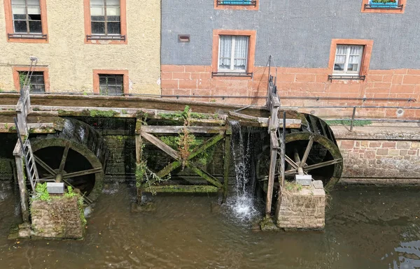 Leuk River flowing into the city of Saarburg towards the ancient water mills. (Germany)