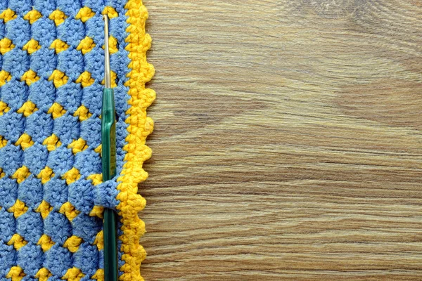 Blue Yellow Crochet Textile Crochet Hook Wooden Background Copy Space — Stock Photo, Image