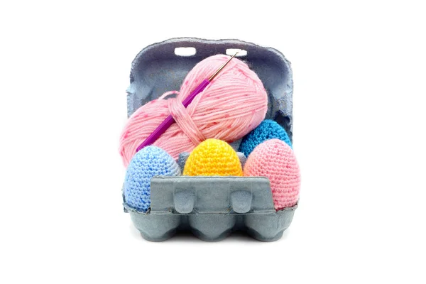 Easter eggs box tray with crochet eggs in blue pink yellow — Stock Photo, Image