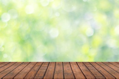 Boş tablo üzerinde yeşil arka plan bulanık. Uzay kopyalayın. Doku, ahşap arka plan, zemin.