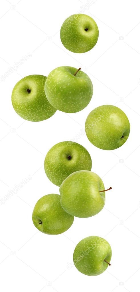 Falling (flying) green apples isolated on white background.  The whole fruit.