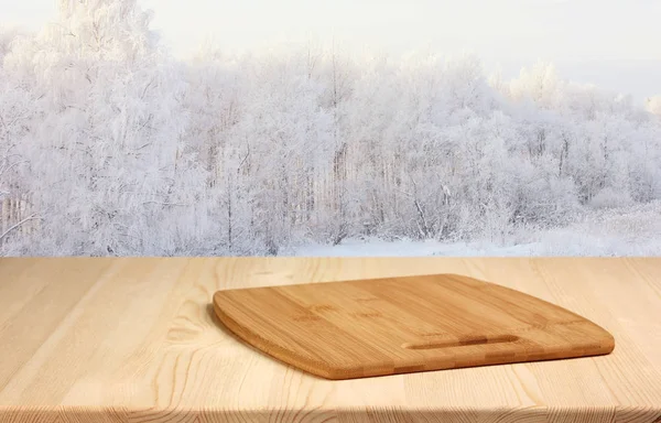 Wooden Table Cutting Board Blurred Winter Background Empty Space Your — Stock Photo, Image