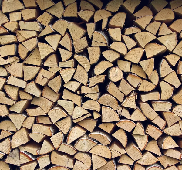 Birch split wood, stacked in a woodpile. background, wood textur — Stock Photo, Image