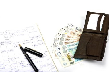 Muhasebe İngiliz para birimi sterlini beyaz arka planda izole edildi.