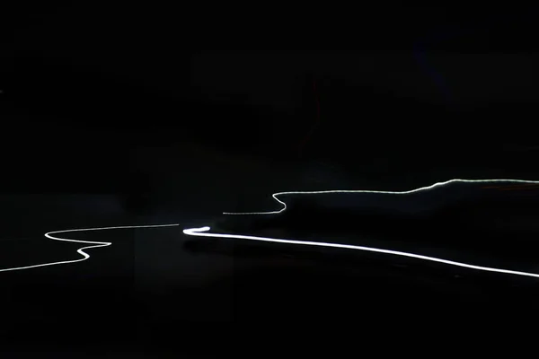 Poruszenie Smug Światła Samochodu Autostradzie Czarnym Tle — Zdjęcie stockowe