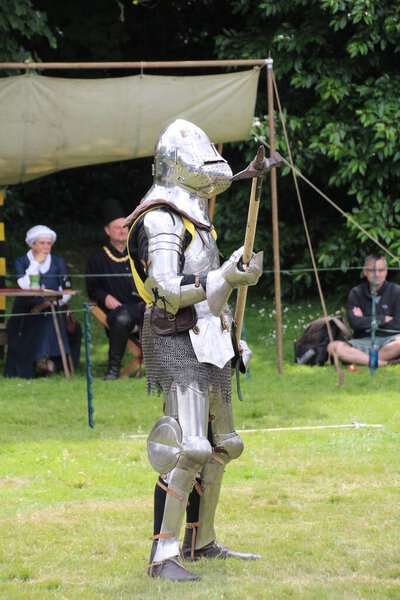 Battle, UK - 14 July, 2019: Knights tournament. Held throughout the Summer at several locations. Four knights re-enactors compete against each other in a series of trials using swords, longbow, mace etc, to establish who is the champion.