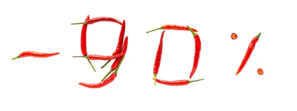 Hot sale or discount concept. Writing made of fresh chilli peppers on white background. Ninety percent discount rate