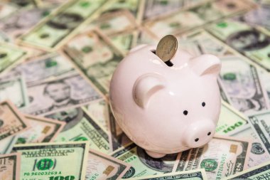 Kumbara dolarlarına arka plan üzerinde 