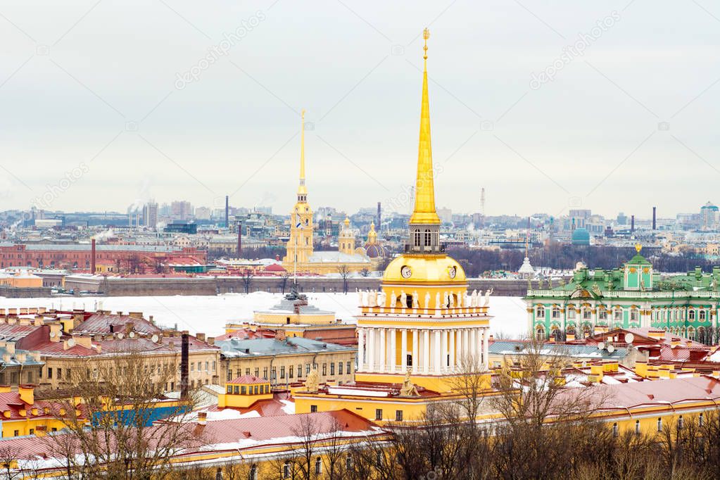 View of roofs and spires in winter city