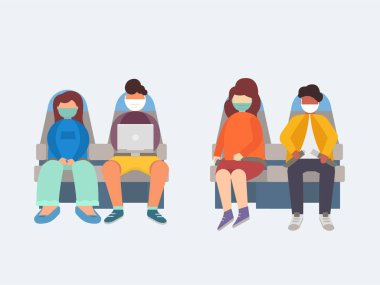 Tıbbi maskeli insanlar uçakta otururlar..