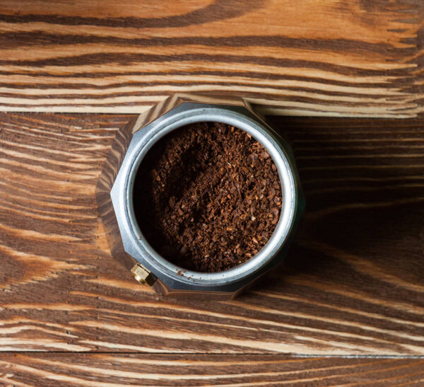 Coffee maker gazer on wood desk with beans