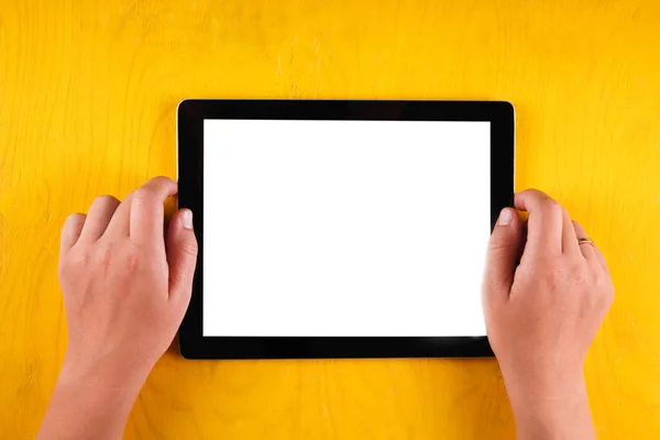 Computer tablet with hand. Top view. Place for text